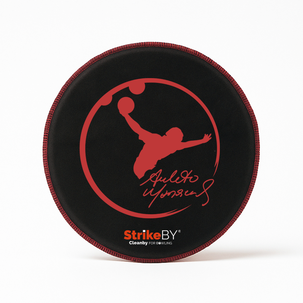 Black shammy with red logo of Amleto Monacelli and 'Strike BY' branding on a white background