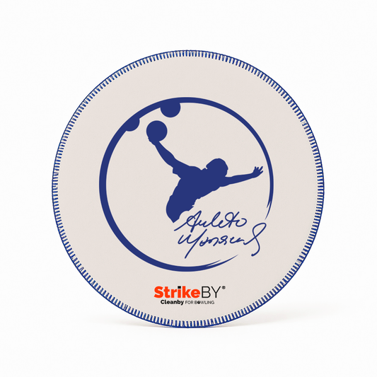 White shammy with blue print of Amleto Monacelli  and 'Strike BY' branding on a white background