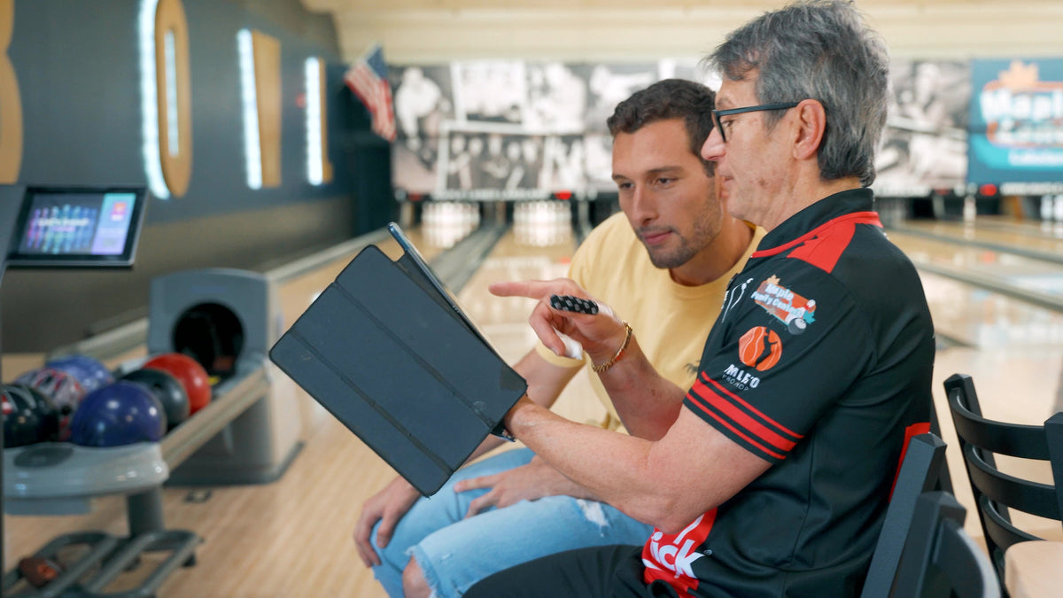 Amleto Monacelli reviewing bowling technique with a private lesson student